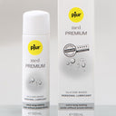 Bottle and packaging of pjur med Premium silicone-based personal lubricant on a gray background